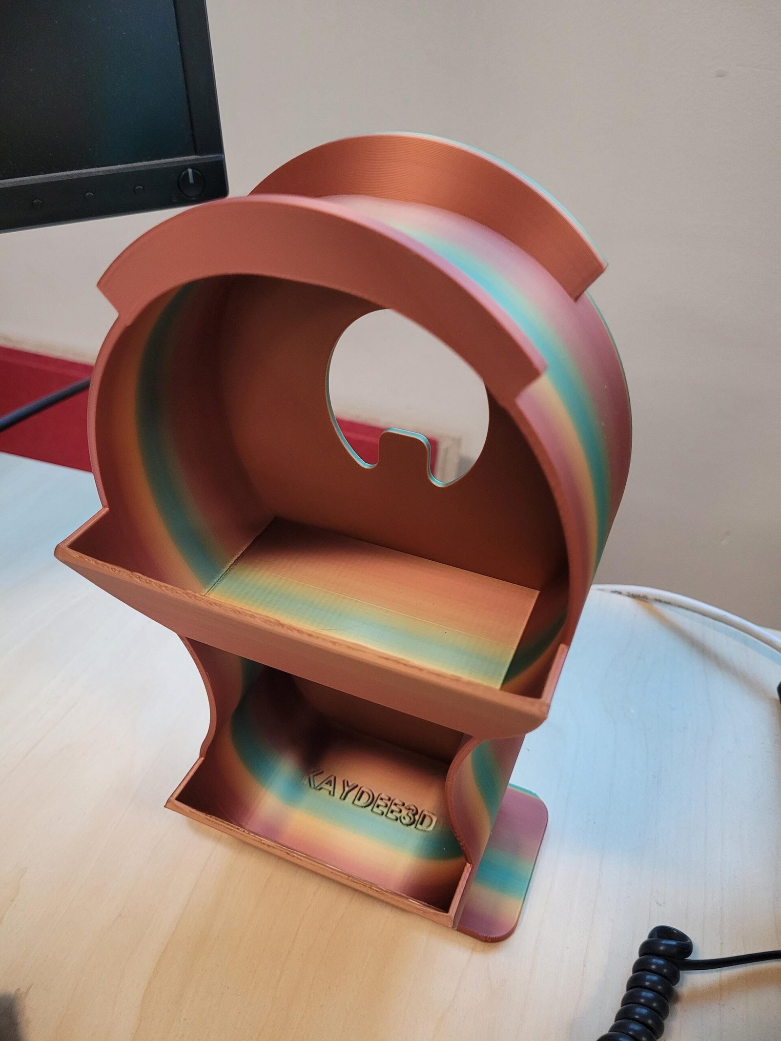 Side view of the metallic finish headphone holder
