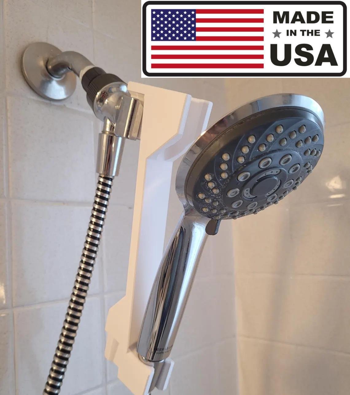Shower head height adjuster installed on a handheld shower in a bathroom