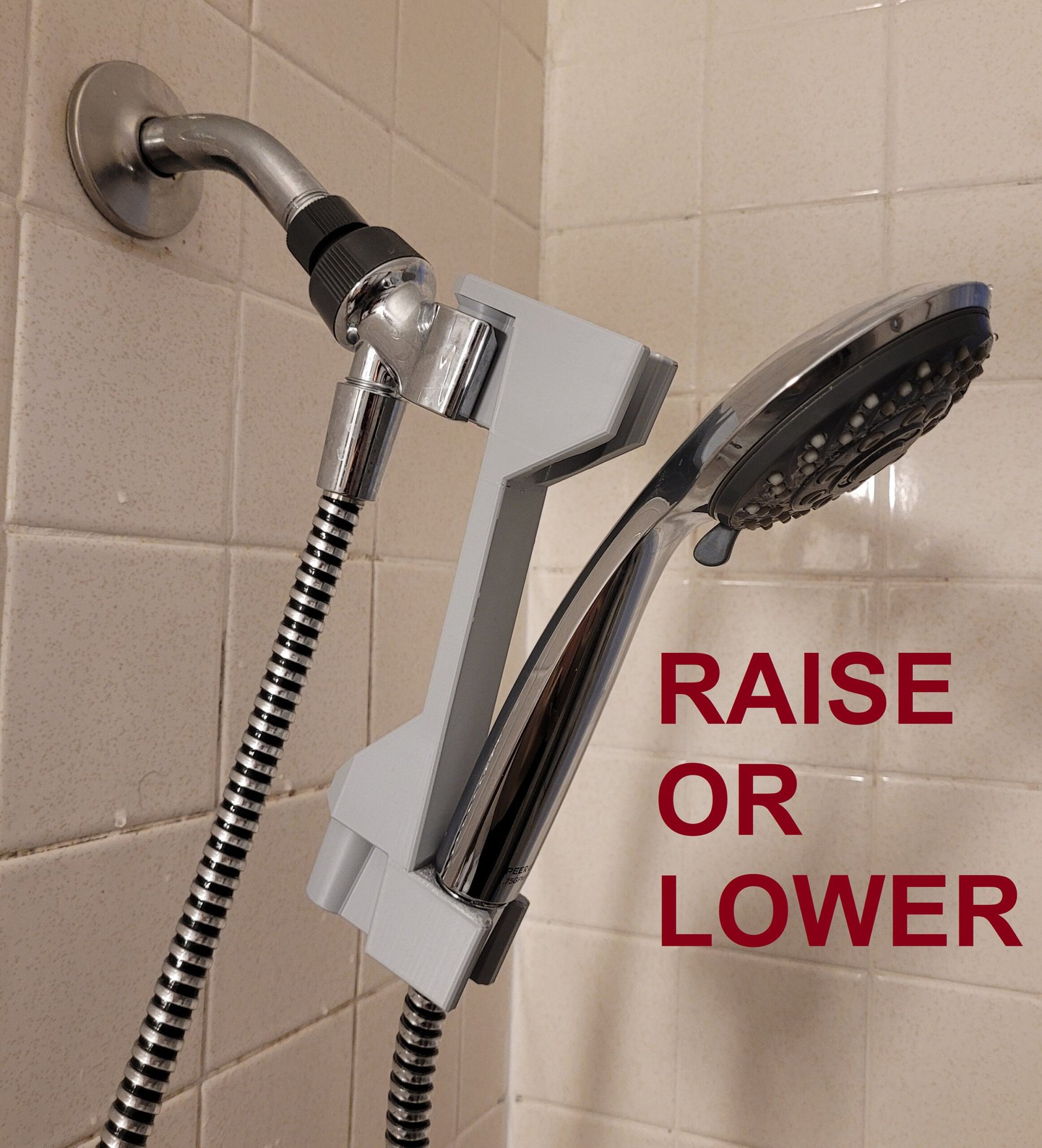 Shower head adjuster set to the lower position for raising shower height