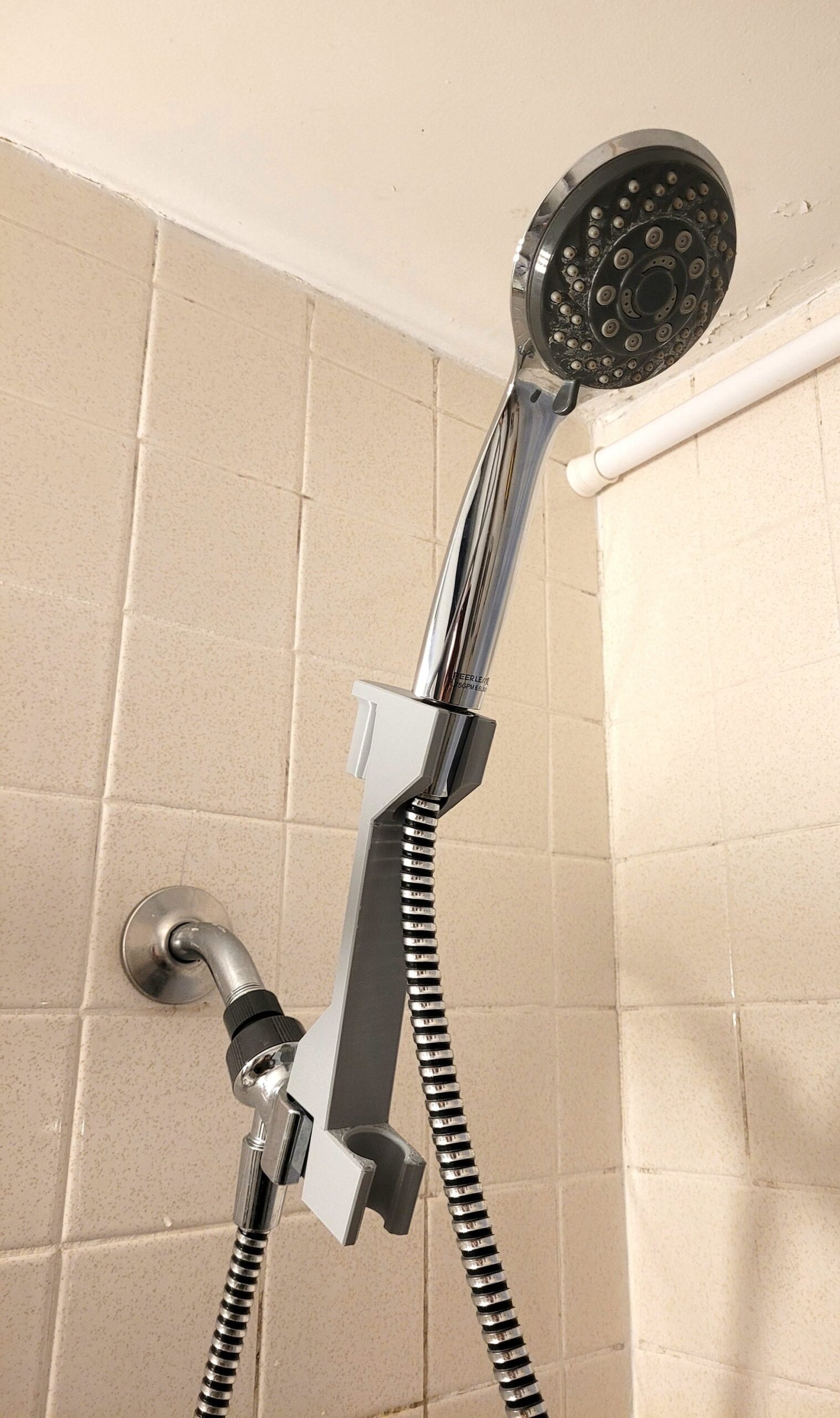 Shower head height adjuster size and extension comparison