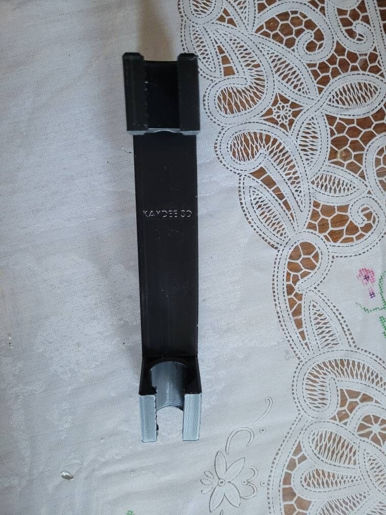 Finished 3D print of the shower head lowering extension